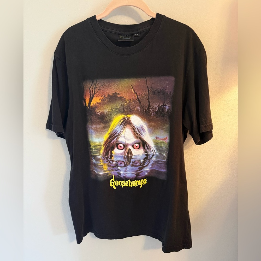 Goosebumps Black Graphic Tee with Creepy Water Artwork